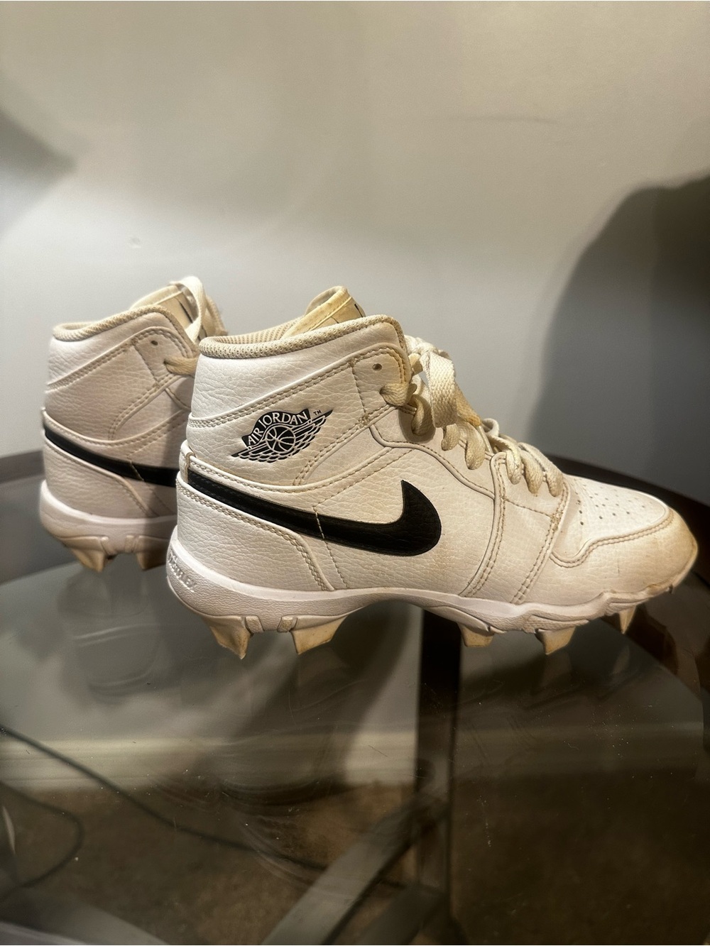 Nike White High-Top Football Cleats with Black Swoosh